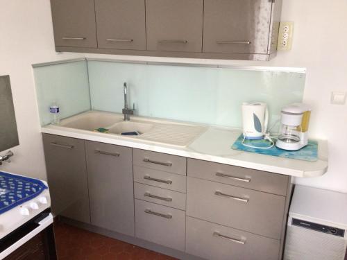 Kitchen, Sara's Home 24 in Avenue de la Liberation Kitchen, Sara's Home 24 in Avenue de la Liberation