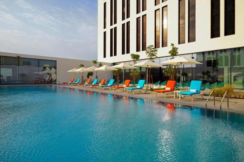 Swimming pool, Aloft Me'aisam, Dubai in Dubailand Swimming pool, Aloft Me'aisam, Dubai in Dubailand
