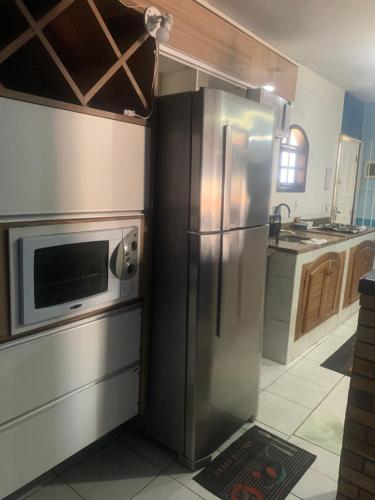 ห้องครัว, Casa ampla a 100 passos do mar, piscina, churrasqueira, salão de jogos (Casa ampla a 100 passos do mar, piscina, churrasqueira, salao de jogos) in บาร์ราโนวา ห้องครัว, Casa ampla a 100 passos do mar, piscina, churrasqueira, salão de jogos (Casa ampla a 100 passos do mar, piscina, churrasqueira, salao de jogos) in บาร์ราโนวา