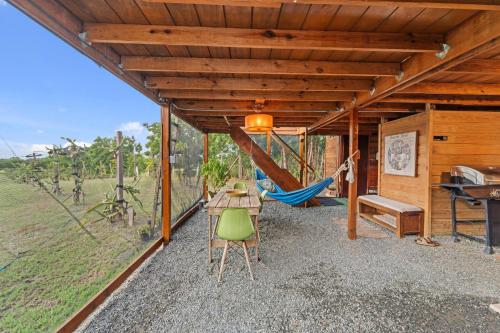 Jagatud salong / TV-ala, Pitahaya Retreat - Cozy Glamping Escape in La Parguera Jagatud salong / TV-ala, Pitahaya Retreat - Cozy Glamping Escape in La Parguera