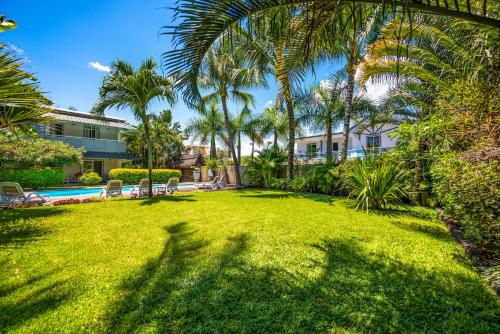 Garten, Stylish Studio with balcony, view on pool and garden in Pointe aux Cannoniers Garten, Stylish Studio with balcony, view on pool and garden in Pointe aux Cannoniers