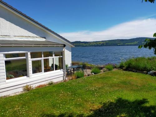 حديقة, Peaceful Sea View Home only 5 miles from Inverness in Bogallan حديقة, Peaceful Sea View Home only 5 miles from Inverness in Bogallan