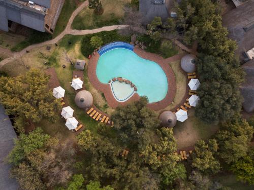 泳池, 巴庫蓬布什旅館 (Bakubung Bush Lodge) in 匹蘭斯堡 泳池, 巴庫蓬布什旅館 (Bakubung Bush Lodge) in 匹蘭斯堡