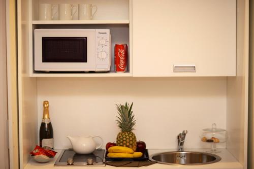 Kitchen, Tullia and Prisca Relais Guest House in Colosseum and Foro Romano Kitchen, Tullia and Prisca Relais Guest House in Colosseum and Foro Romano