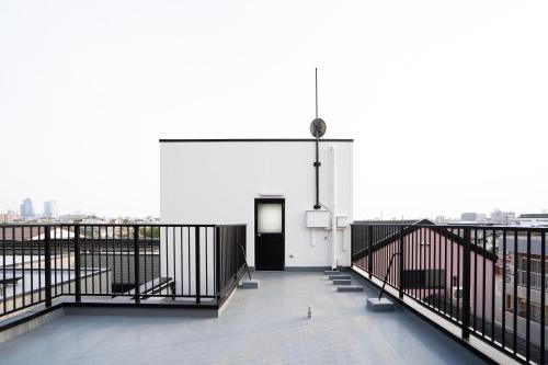 Balcony/terrace, raikoエレベーター付き大人数向け一棟貸切宿 in Kiyosu Balcony/terrace, raikoエレベーター付き大人数向け一棟貸切宿 in Kiyosu