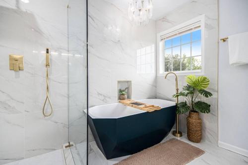 Facilities, Boho Luxury| EV charger| Fenced Yard | King Beds in Collier Heights Facilities, Boho Luxury| EV charger| Fenced Yard | King Beds in Collier Heights