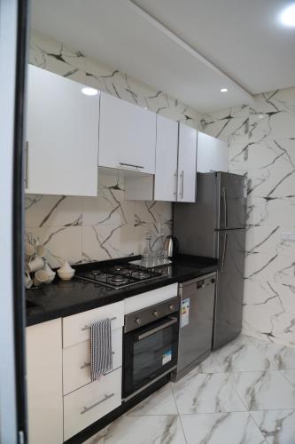 Kitchen, apartamento nuevo cerca del mar in Martil Kitchen, apartamento nuevo cerca del mar in Martil