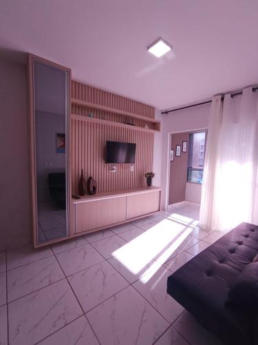 Shared lounge/TV area, Confortavel Apto de 2 Quartos - Lagoa Quente in St. Lagoa Quente Shared lounge/TV area, Confortavel Apto de 2 Quartos - Lagoa Quente in St. Lagoa Quente