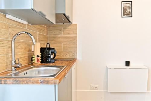 keittiö, Studio équipé dans le 18ème arrondissement (Studio equipe dans le 18eme arrondissement) in Pigalle keittiö, Studio équipé dans le 18ème arrondissement (Studio equipe dans le 18eme arrondissement) in Pigalle