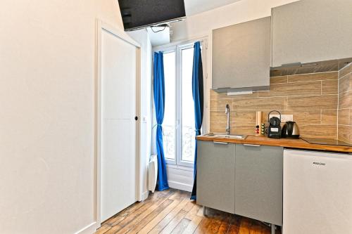 keittiö, Studio équipé dans le 18ème arrondissement (Studio equipe dans le 18eme arrondissement) in Pigalle keittiö, Studio équipé dans le 18ème arrondissement (Studio equipe dans le 18eme arrondissement) in Pigalle