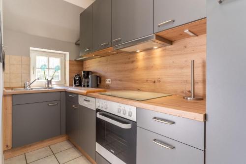 Kitchen, Auszeit unter Reet in Waldstrasse Kitchen, Auszeit unter Reet in Waldstrasse