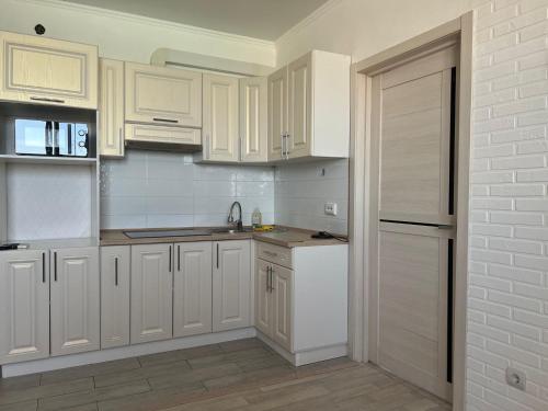 Cocina, Квартира в башнях по Датова in Uralsk Cocina, Квартира в башнях по Датова in Uralsk