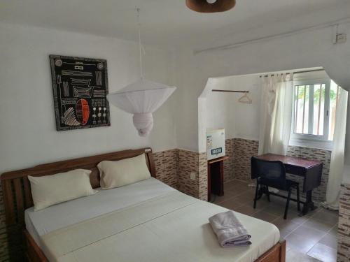 חדר שינה, Casa Cacheu Homestay Guest House in ביסאו חדר שינה, Casa Cacheu Homestay Guest House in ביסאו