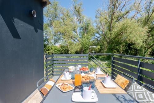 Erkély/terasz, Appartement La Baule Pornichet Terrasse - Cuisine - Calme - Wifi - Parking Gratuit in Pornichet Erkély/terasz, Appartement La Baule Pornichet Terrasse - Cuisine - Calme - Wifi - Parking Gratuit in Pornichet