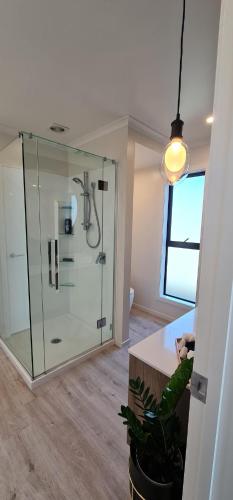 Bathroom, Kakianau Retreat, Luxury Waterfront Unit A near The Royal Albatross Centre Bathroom, Kakianau Retreat, Luxury Waterfront Unit A near The Royal Albatross Centre