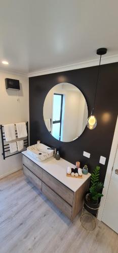 Bathroom, Kakianau Retreat, Luxury Waterfront Unit A near The Royal Albatross Centre Bathroom, Kakianau Retreat, Luxury Waterfront Unit A near The Royal Albatross Centre