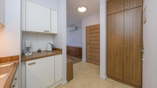 ห้องครัว, Prywatne apartamenty w obiekcie Gwiazda Morza, Sun & Snow in วลาดิสลาโวโว ห้องครัว, Prywatne apartamenty w obiekcie Gwiazda Morza, Sun & Snow in วลาดิสลาโวโว