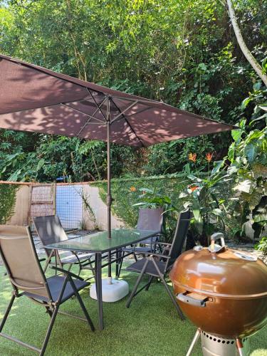 Kert, Casa Jardim Corumbê (Casa Jardim Corumbe) in Praia Grande Kert, Casa Jardim Corumbê (Casa Jardim Corumbe) in Praia Grande