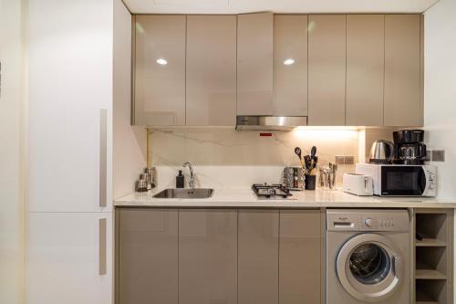 Kitchen, Stylish Bright Studio with Balcony & Cozy Escape in Nad Al Sheba Kitchen, Stylish Bright Studio with Balcony & Cozy Escape in Nad Al Sheba