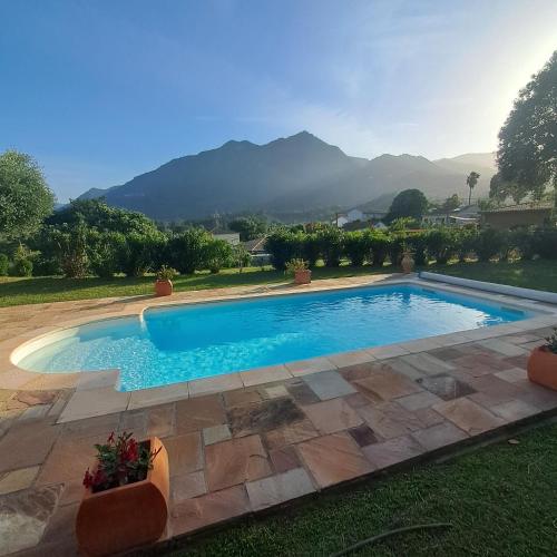 Úszómedence, A Casuccia - Maison traditionnelle Corse avec piscine privée (A Casuccia - Maison traditionnelle Corse avec piscine privee) in San Nicolao Úszómedence, A Casuccia - Maison traditionnelle Corse avec piscine privée (A Casuccia - Maison traditionnelle Corse avec piscine privee) in San Nicolao