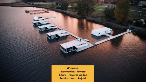 Grand HT Houseboats - domki na wodzie - sauna, jacuzzi, kominek in Mielno Grand HT Houseboats - domki na wodzie - sauna, jacuzzi, kominek in Mielno