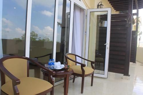 Balcony/terrace, Chau Pho Hotel near Chau Doc Covered Market Balcony/terrace, Chau Pho Hotel near Chau Doc Covered Market