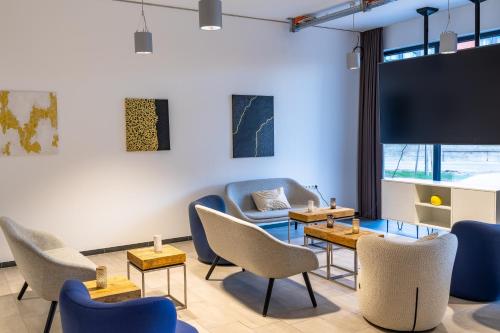 صالة مشتركة/ منطقة التلفزيون, MASEVEN Frankfurt Messe in جوتليتفيرتيل صالة مشتركة/ منطقة التلفزيون, MASEVEN Frankfurt Messe in جوتليتفيرتيل