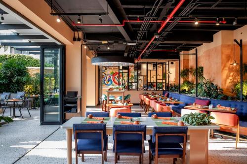 Restaurant, Holiday Inn San Jose La Sabana by IHG in Uruca Restaurant, Holiday Inn San Jose La Sabana by IHG in Uruca