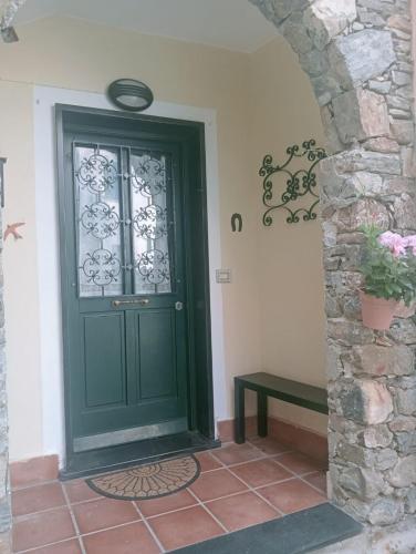 Bejárat, CASA L'UNICORNO con giardino privato in Dosso Bejárat, CASA L'UNICORNO con giardino privato in Dosso