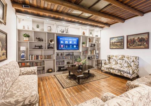 Közös társalgó / TV, Hacienda Chorlavi in Ibarra Közös társalgó / TV, Hacienda Chorlavi in Ibarra