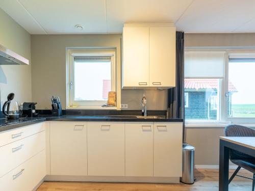 Kitchen, Holiday Home in Scherpenisse near Nature Reserve, cleaning included in Tholen Kitchen, Holiday Home in Scherpenisse near Nature Reserve, cleaning included in Tholen