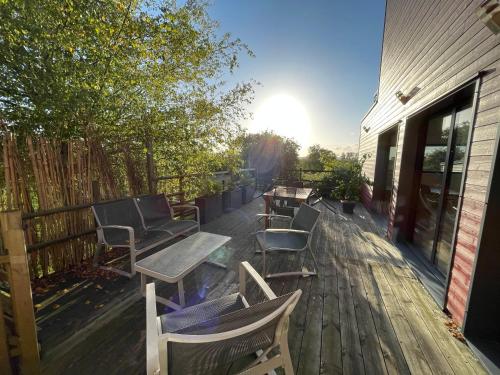 Balcony/terrace, Piscine interieure privee chauffee toute l annee et spa St Martin in Le Quesnay Balcony/terrace, Piscine interieure privee chauffee toute l annee et spa St Martin in Le Quesnay