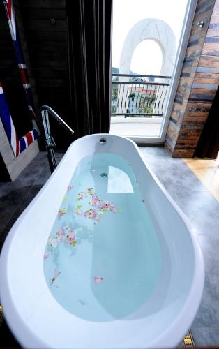 חדר אמבטיה, Four Sisters Villa in Kenting חדר אמבטיה, Four Sisters Villa in Kenting