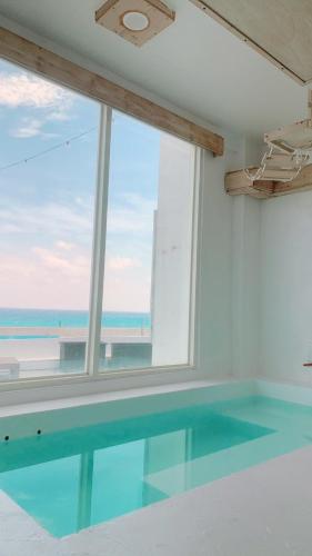 白嶼光日出海景民宿 (White & Light B&B) in 墾丁國家公園 白嶼光日出海景民宿 (White & Light B&B) in 墾丁國家公園