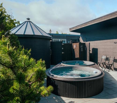 Hot tub, INNI - Boutique apartments in Hveragerdhi Hot tub, INNI - Boutique apartments in Hveragerdhi