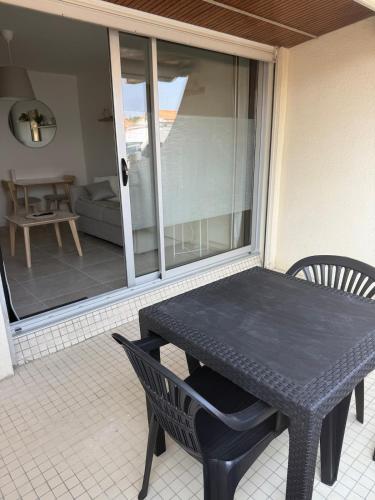 Terraza/balcón, La parenthèse - 50 m de la plage (La parenthese - 50 m de la plage) in Saint-Jean-de-Monts Terraza/balcón, La parenthèse - 50 m de la plage (La parenthese - 50 m de la plage) in Saint-Jean-de-Monts