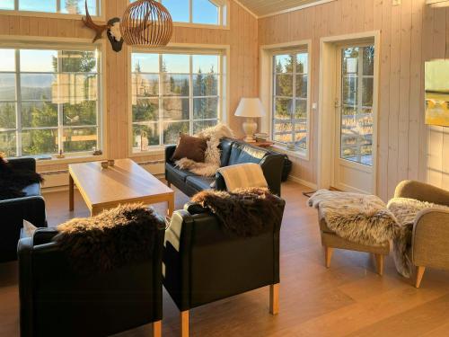 Exterior view, Modern Mountain Cabin With Panoramic Views in Sjusjoen Exterior view, Modern Mountain Cabin With Panoramic Views in Sjusjoen