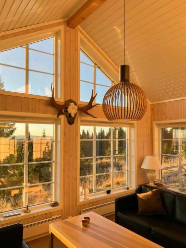 Exterior view, Modern Mountain Cabin With Panoramic Views in Sjusjoen Exterior view, Modern Mountain Cabin With Panoramic Views in Sjusjoen