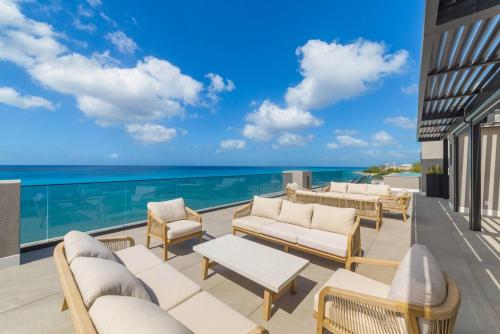 Общая зона отдыха/ТВ, Allure 502, Beachfront Penthouse by ZenBreak in Бриджтаун Общая зона отдыха/ТВ, Allure 502, Beachfront Penthouse by ZenBreak in Бриджтаун