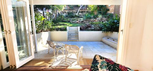 Balcony/terrace, Maroubra Beach House with Lush Garden Oasis in Maroubra Balcony/terrace, Maroubra Beach House with Lush Garden Oasis in Maroubra
