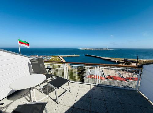 מרפסת, Haus Rooad Weeter in חלגולנד מרפסת, Haus Rooad Weeter in חלגולנד