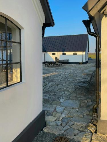 Exterior view, Traditional Farmhouse In The Heart Of Osterlen in Garsnas Exterior view, Traditional Farmhouse In The Heart Of Osterlen in Garsnas