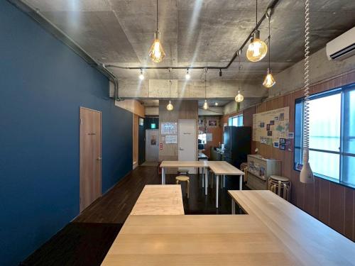 Shared lounge/TV area, 石垣ゲストハウスオハナ in Ishigaki Shared lounge/TV area, 石垣ゲストハウスオハナ in Ishigaki