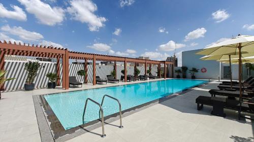 Swimming pool, New Charming Studio in JVC near Jumeirah Village Circle Swimming pool, New Charming Studio in JVC near Jumeirah Village Circle