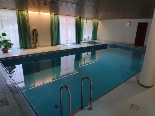 Swimming pool, Next door to the President, 70's vintage luxury in Munkkiniemi Swimming pool, Next door to the President, 70's vintage luxury in Munkkiniemi