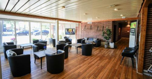 Közös társalgó / TV, Hotel Lynggaarden in Herning Közös társalgó / TV, Hotel Lynggaarden in Herning