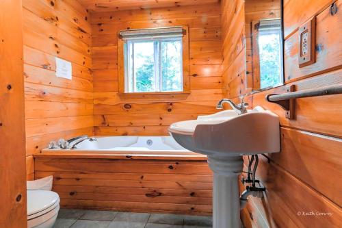 Idyllic Log Cabin Rental with a Porch in the Poconos of Pennsylvania in Canadensis Idyllic Log Cabin Rental with a Porch in the Poconos of Pennsylvania in Canadensis