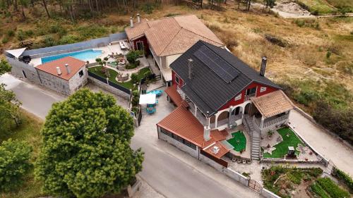 Casa da Pizzaria in คาราปิโต Casa da Pizzaria in คาราปิโต