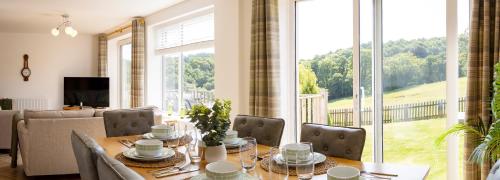 Shared lounge/TV area, FernLea - Cosy bungalow and stunning country views in Glaisdale Shared lounge/TV area, FernLea - Cosy bungalow and stunning country views in Glaisdale