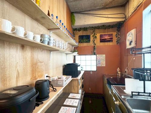 Kitchen, 石垣ゲストハウスオハナ in Ishigaki Kitchen, 石垣ゲストハウスオハナ in Ishigaki